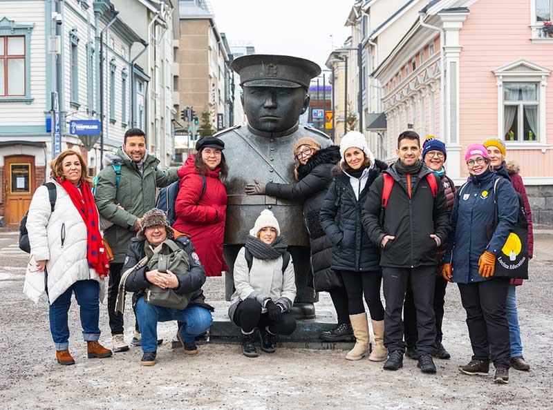 international group of people visiting oulu